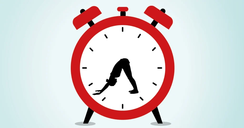 Rysunek zegarka z osobą robiącą psa z głową do dołu zamiast wskazówek